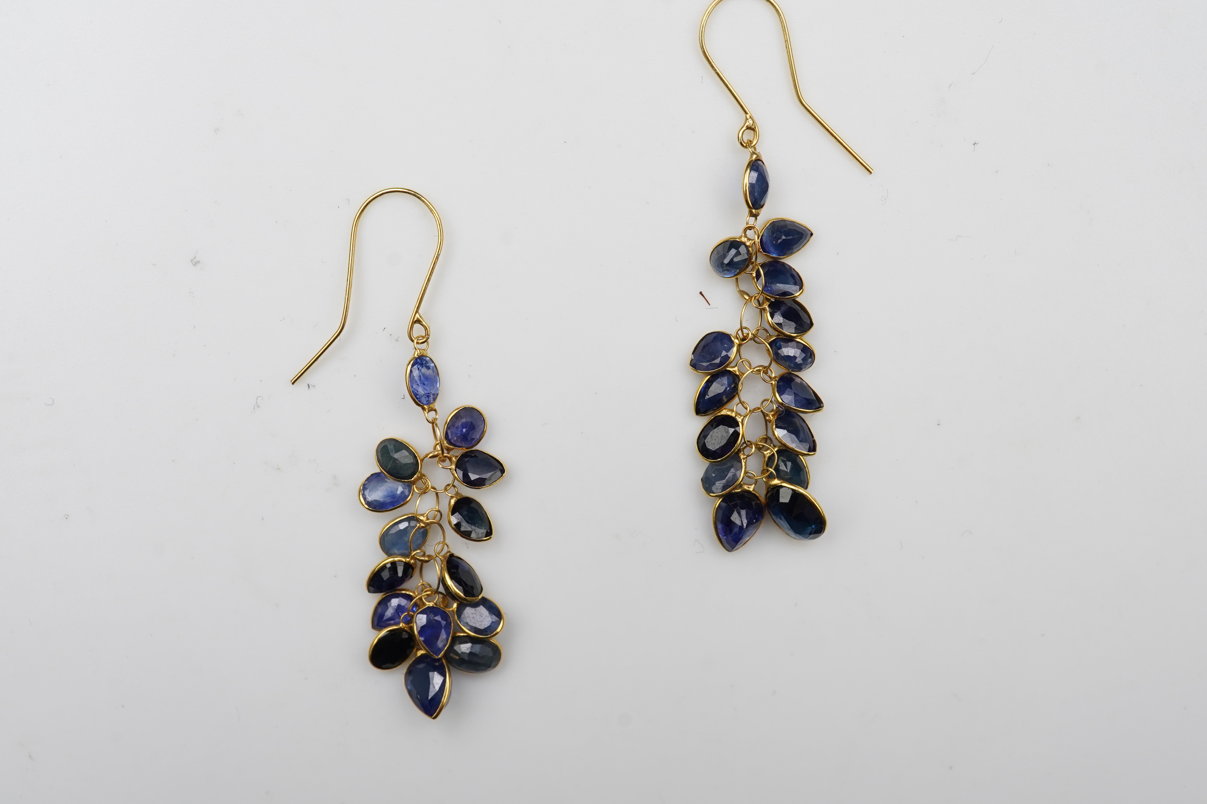 A pair of sapphire pendent earrings